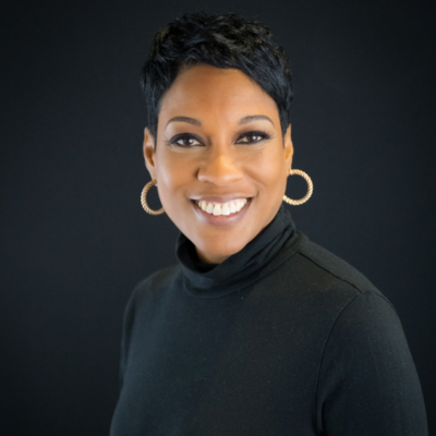 Portrait of Tisha Edwards, Executive Vice President of the Holding Company and President and CEO of the MBA
